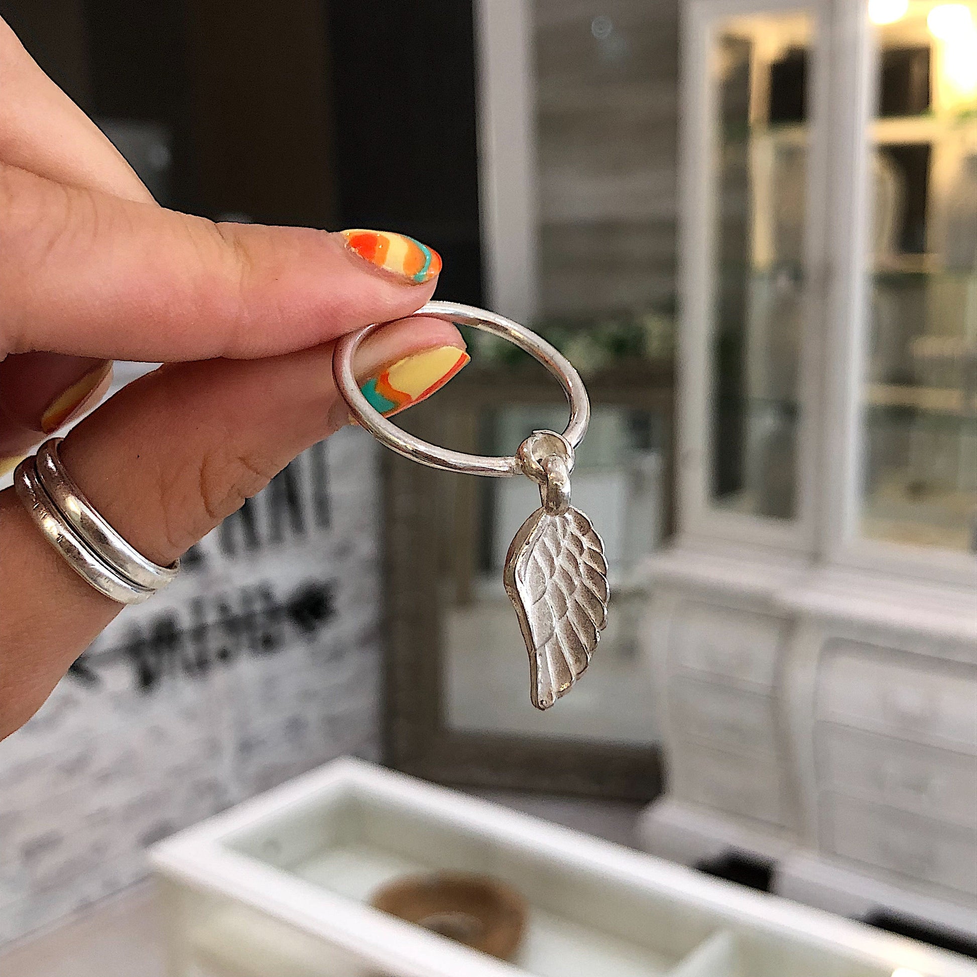Angel Wing Dangle Ring in Sterling Silver