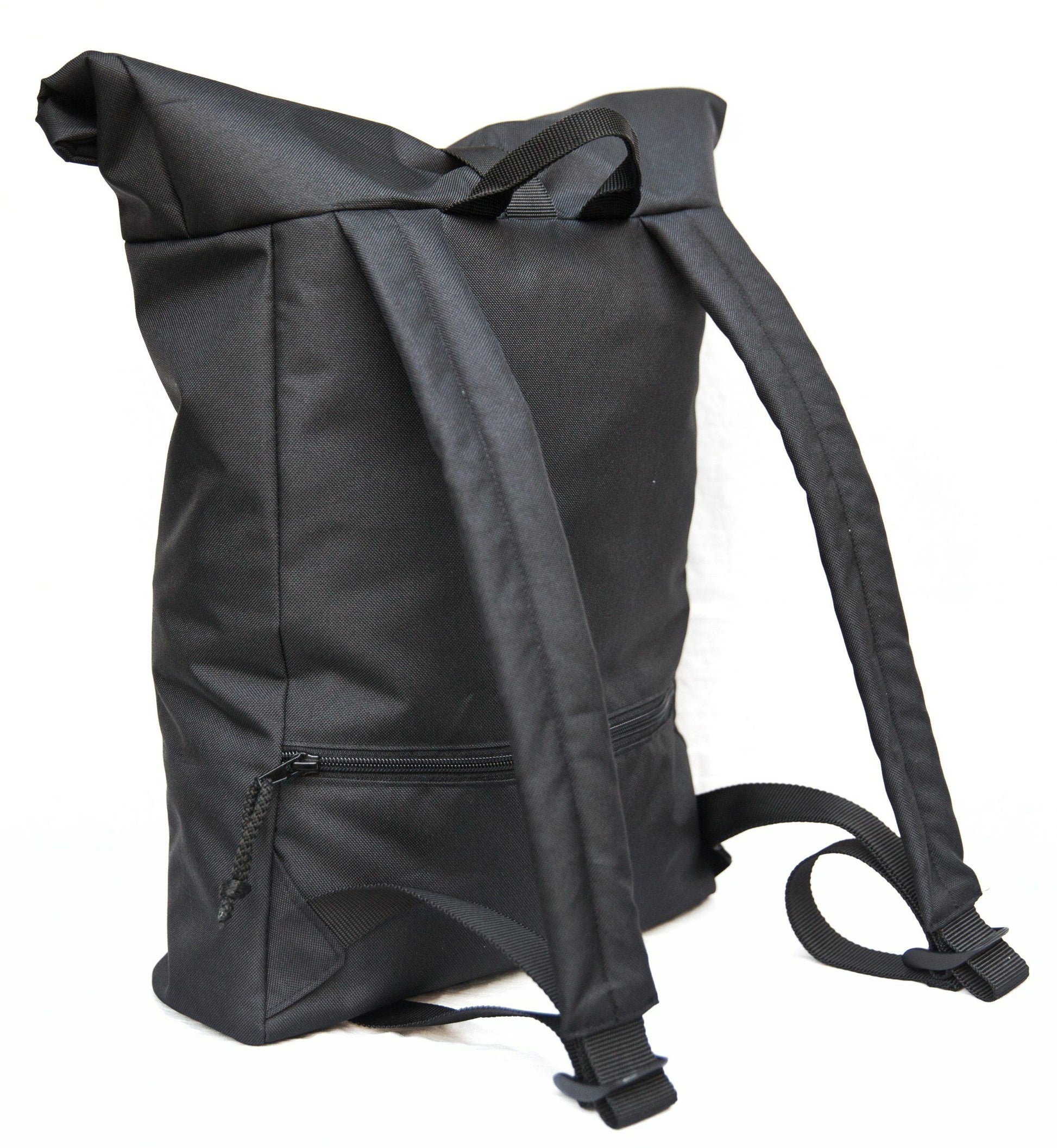 Versatile Roll-Top Backpack – Secure, Stylish & Spacious by Drinbags at www.brixbailey.com