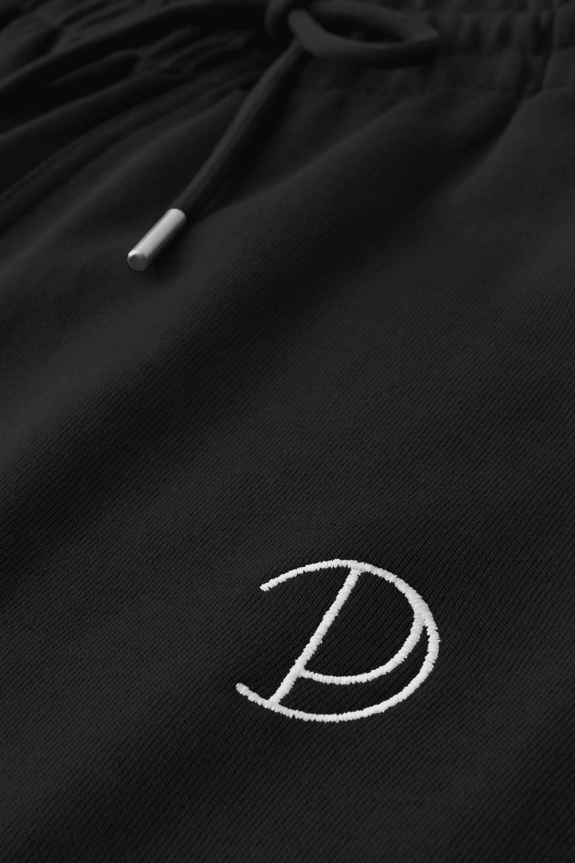 Embroidered P Joggers in Black