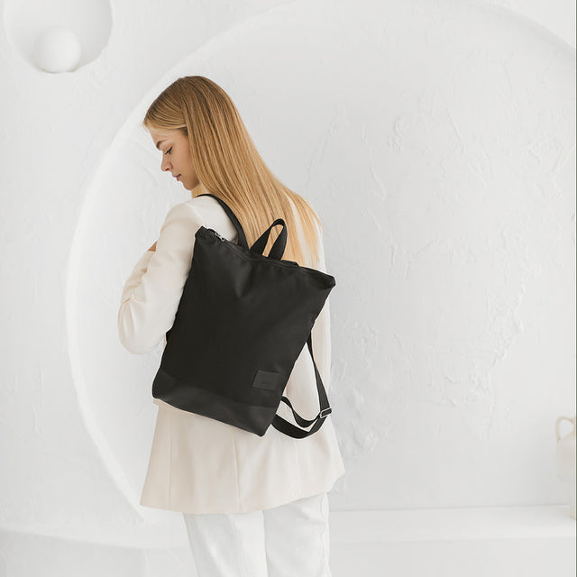 Chic Waterproof Leather Backpack – Stylish & Functional by Muni at www.brixbailey.com