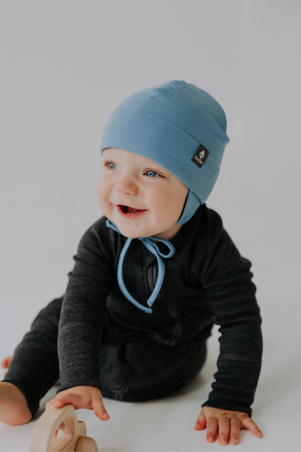 Merino-Lined Baby Hat MIKA – Secure, Warm & Machine Washable by Breden at brixbailey.com