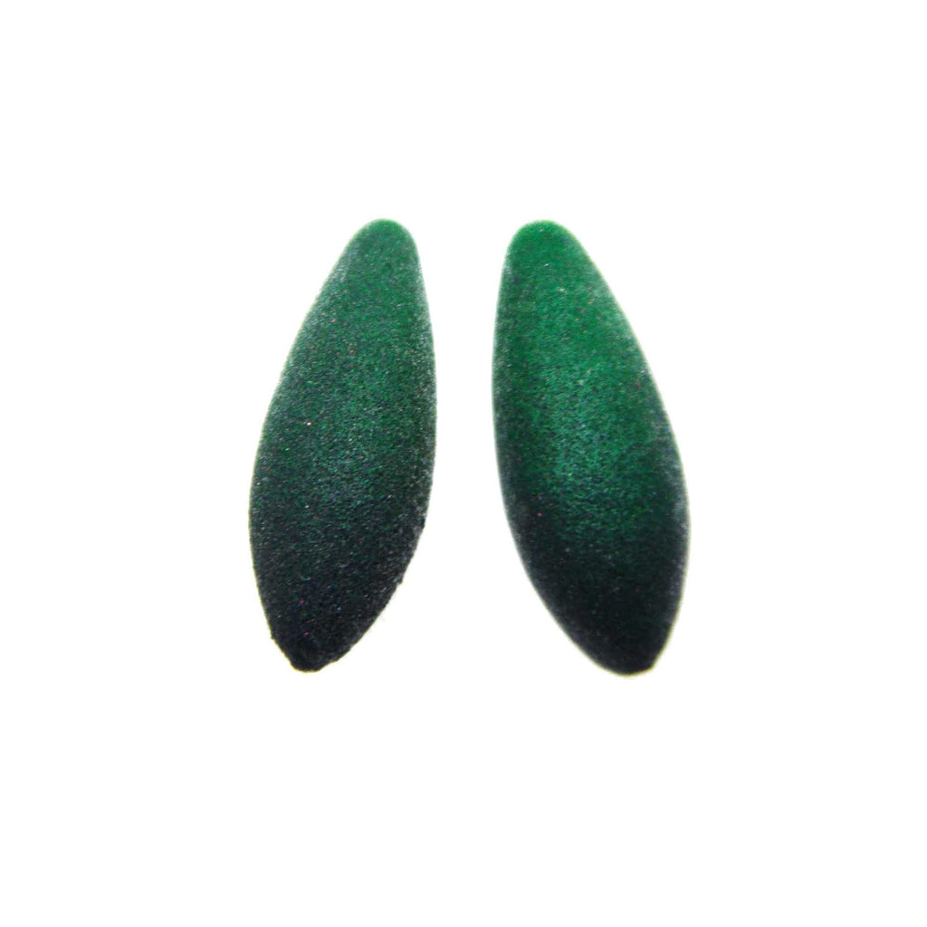 softly lit mini avocado earrings with a comforting velvety texture and cosmic dust sparkle