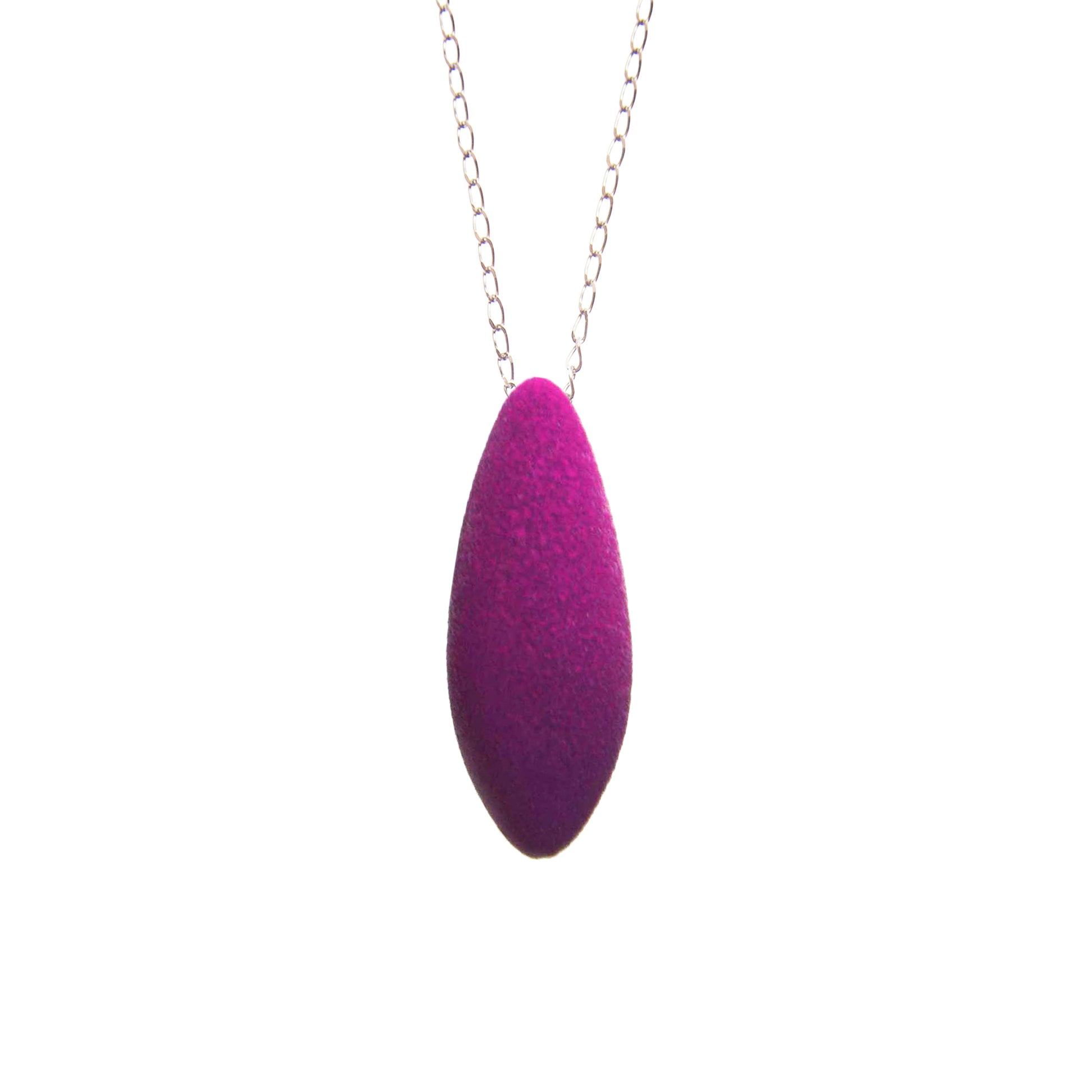 bold mini plum pendant with cosmic dust texture on a dark background