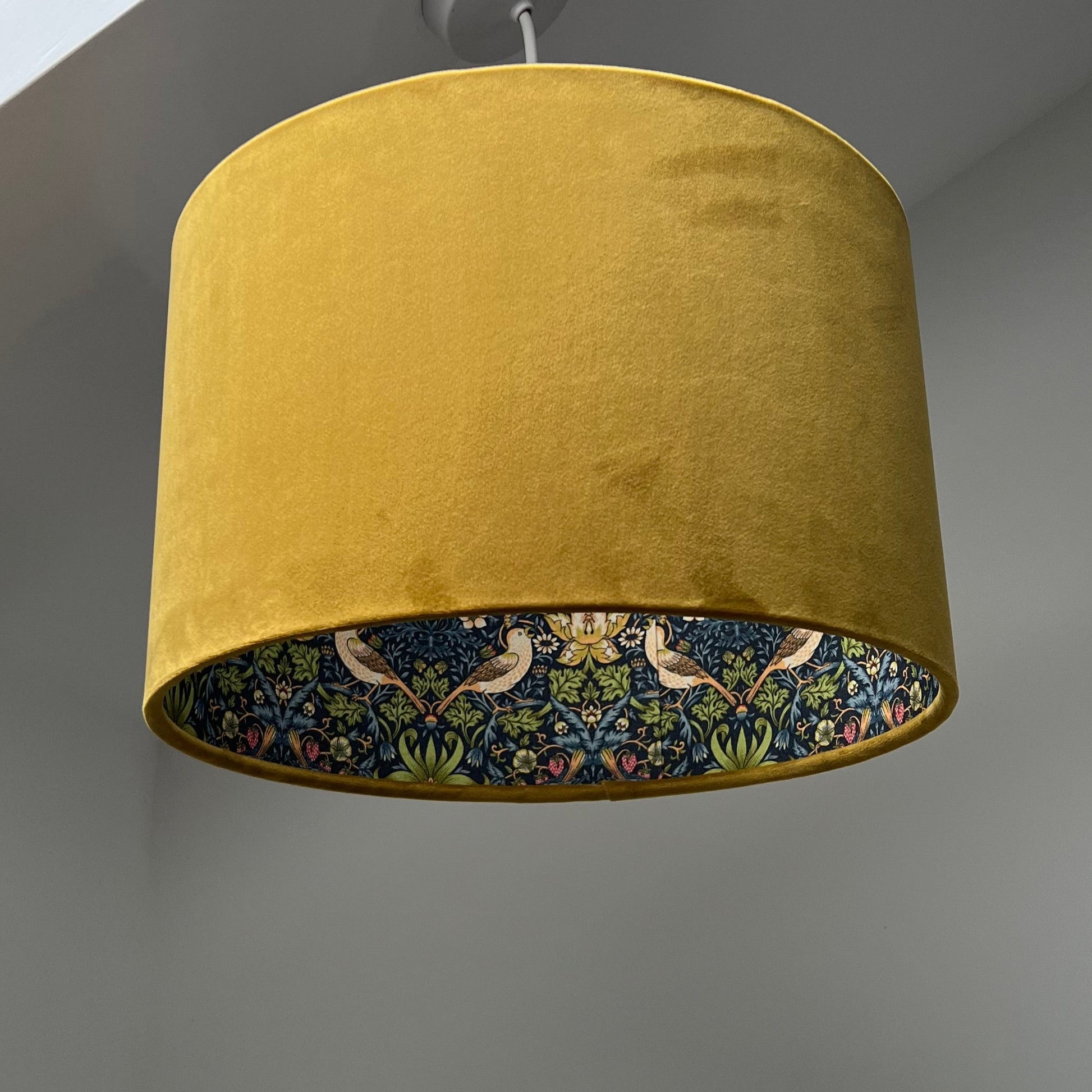 Mustard velvet drum lampshade, double sided lampshade, with strawberry thief navy cotton interior