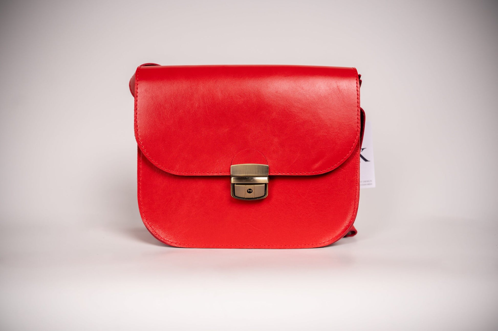 Classic Cut Leather Saddle Bag – Vintage Charm & Modern Utility by Zelma Kraft at brixbailey.com