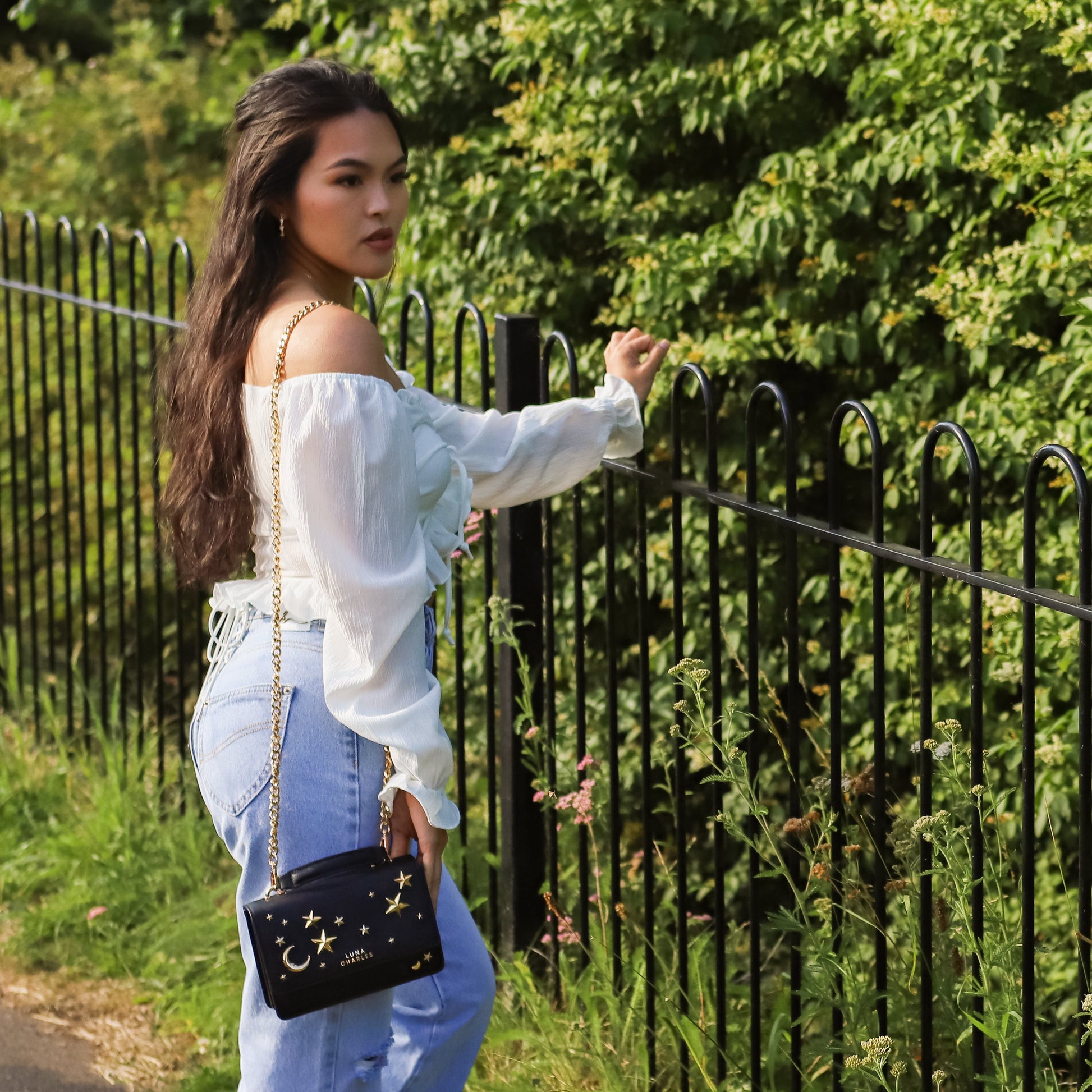 Nova Star Studded Handbag in Black and Gold