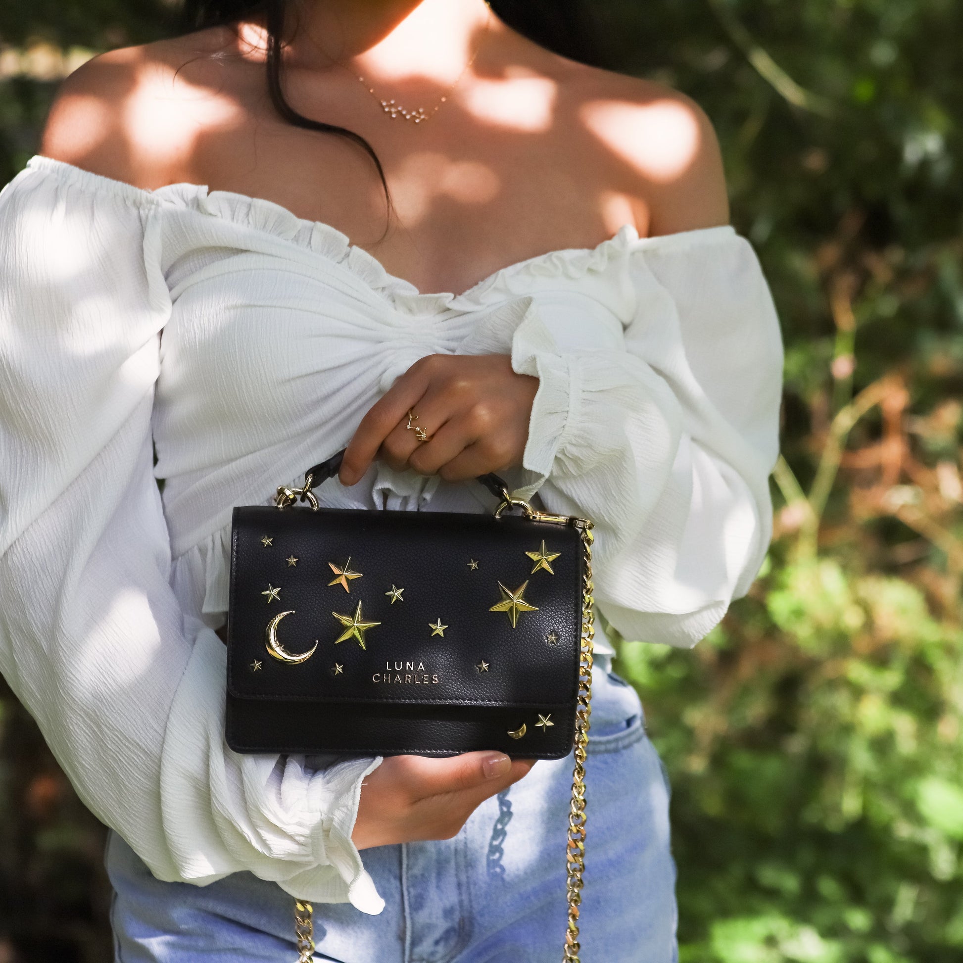 Nova Star Studded Handbag in Black and Gold