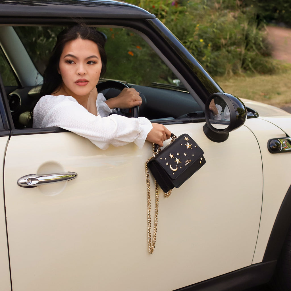 Nova Star Studded Handbag in Black and Gold