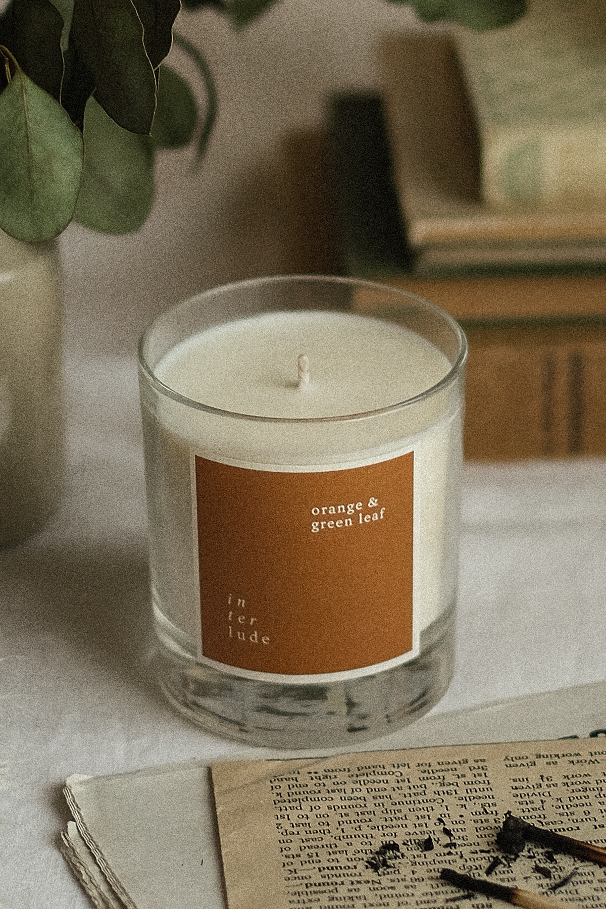 Orange and Green Leaf Scented Candle