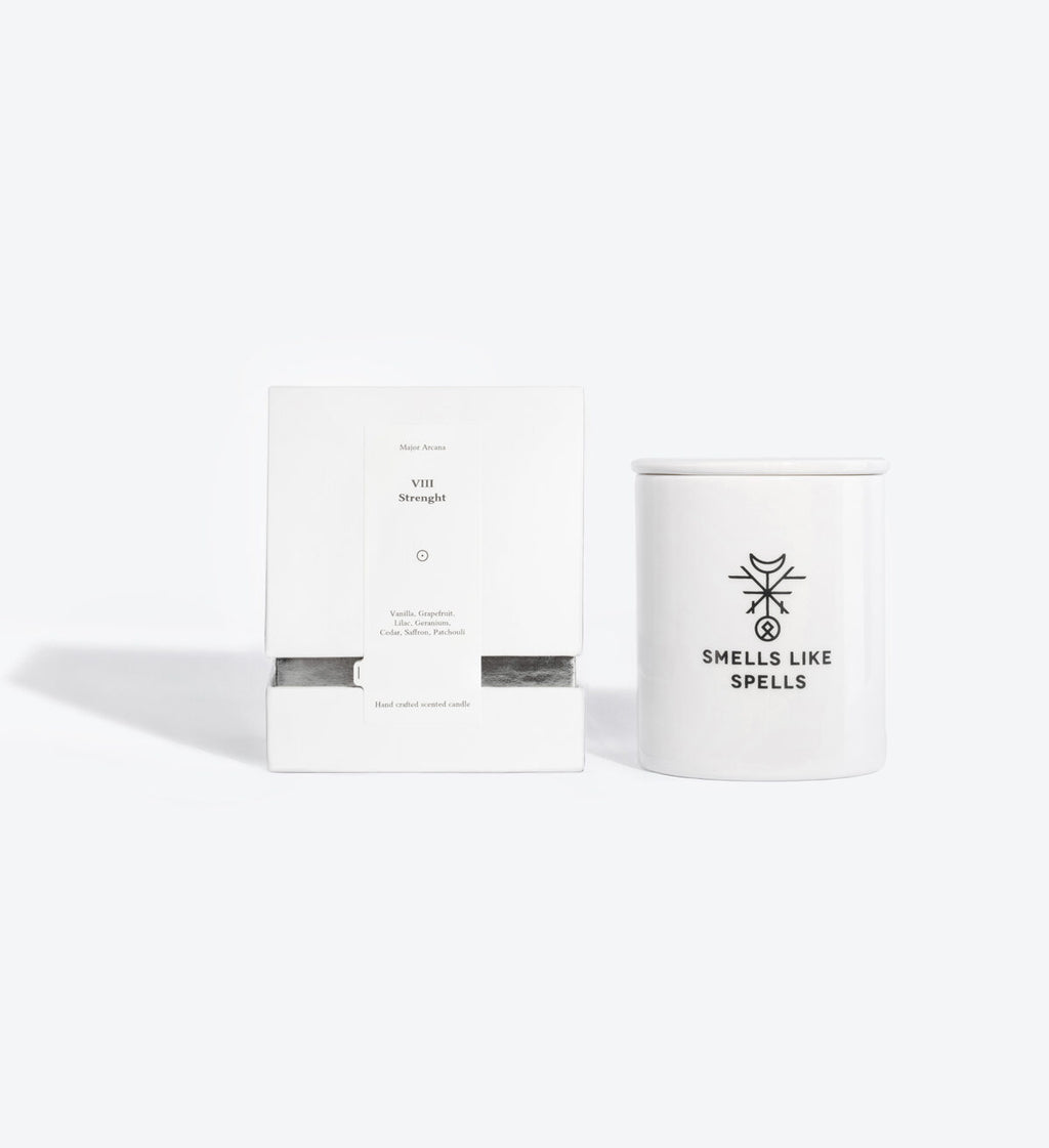 elegant porcelain strength candle with tarot card on marble, grapefruit and vanilla scent