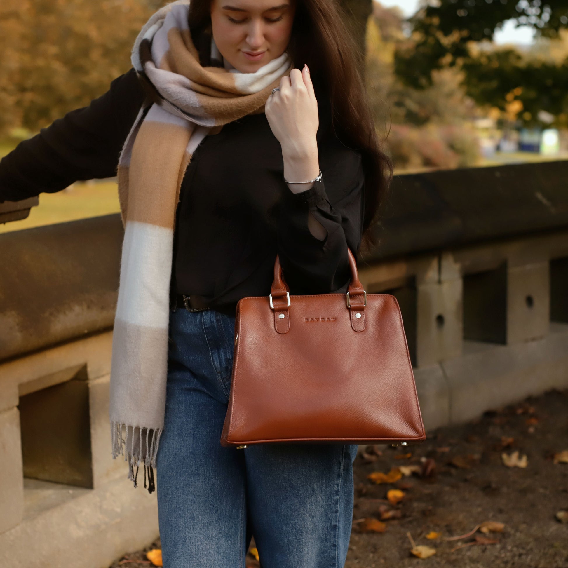 Black Leather Handbag with Adjustable Strap