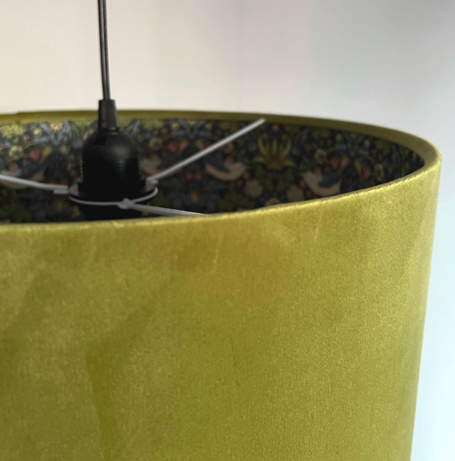 Olive green velvet drum lampshade, double sided lampshade, with navy strawberry thief cotton interior