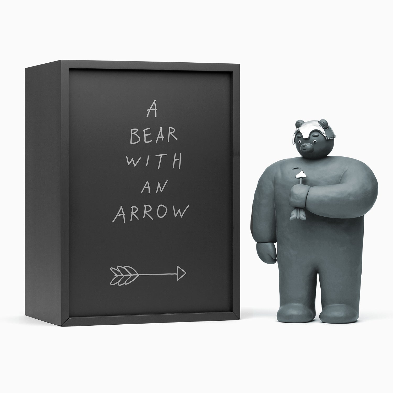 A Bear With An Arrow Sculpture