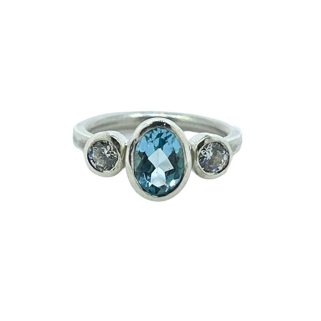 Oval Blue Topaz Trilogy Empire Ring