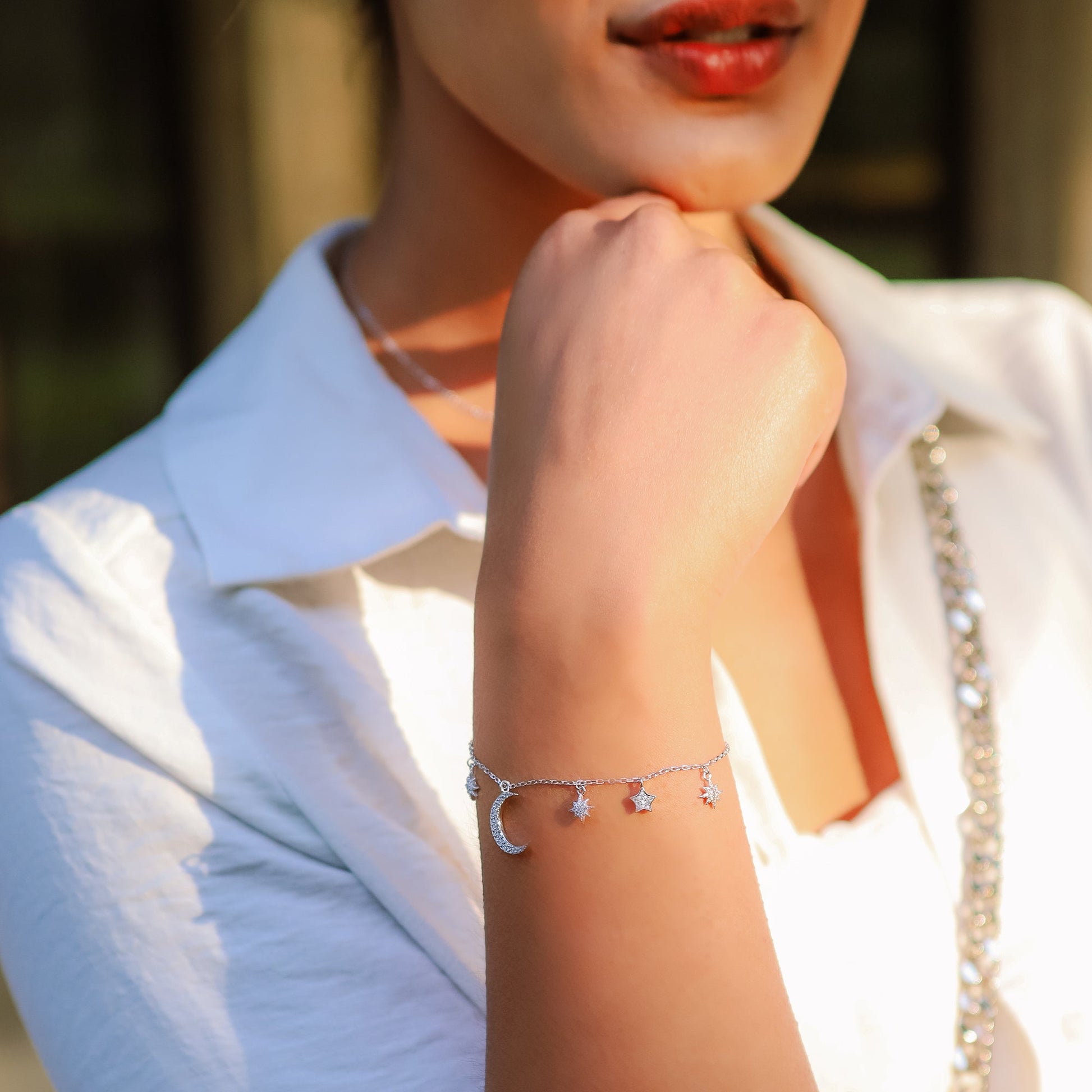 Moon and Star Charm Bracelet in Sterling Silver