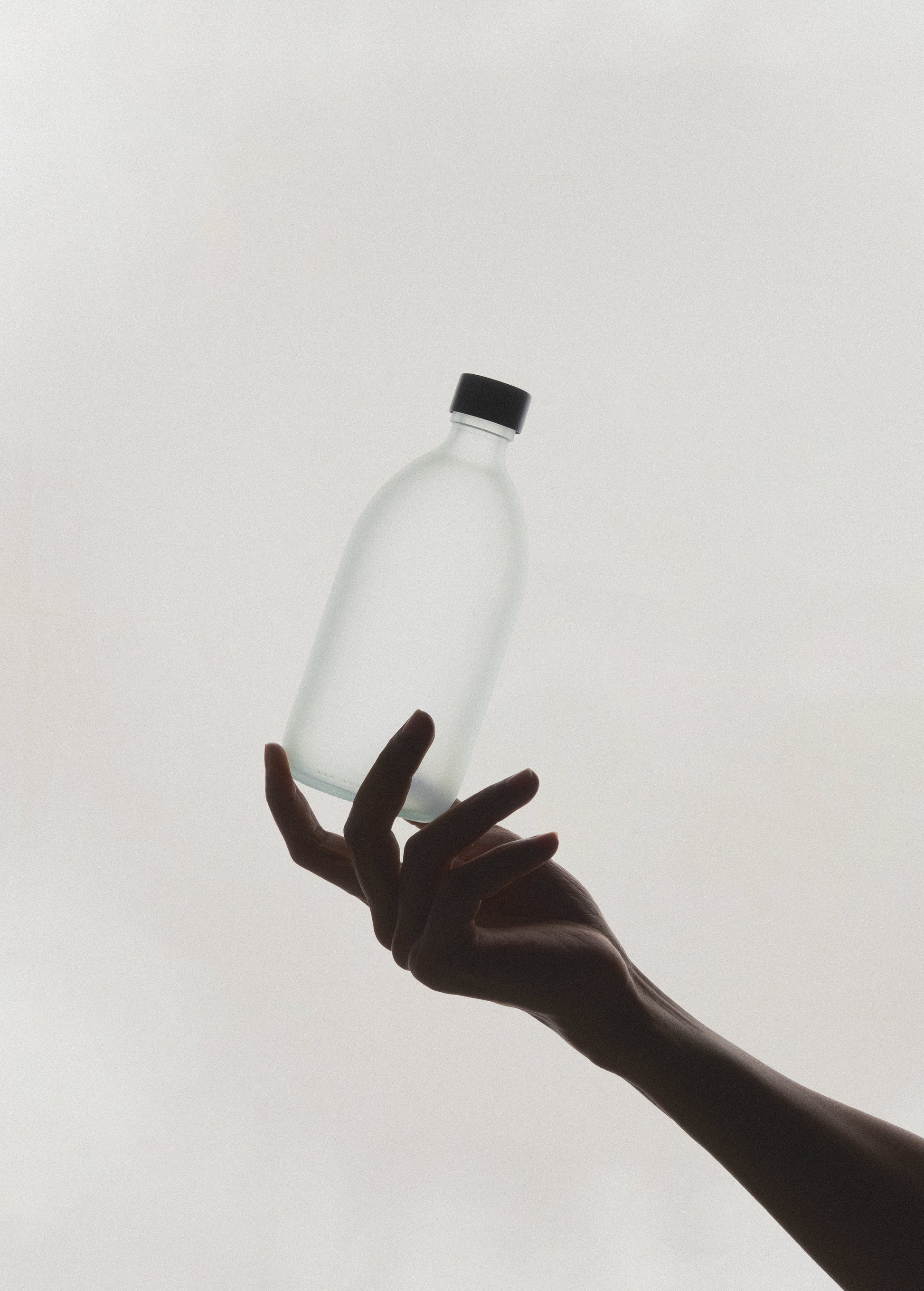 White Glass Bottle and Cap
