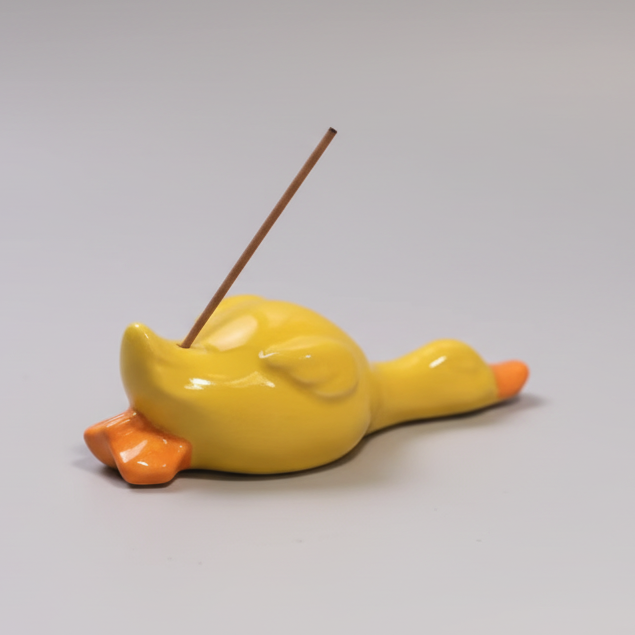 A Ceramic Lazy Duck Incense Holder