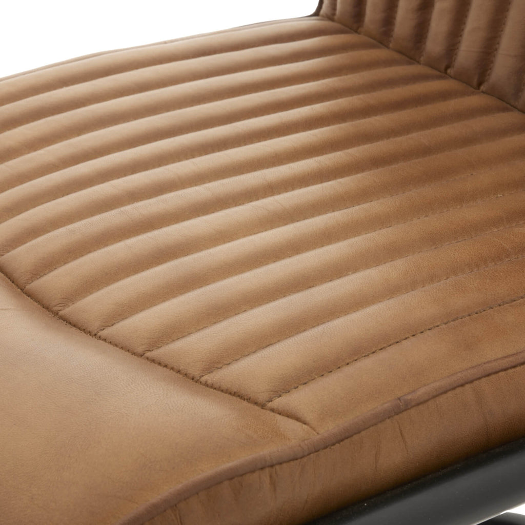 Brown leather Billy dining chair with black metal frame, channeled back, and industrial design for modern interiors by Sostter at brixbailey.com