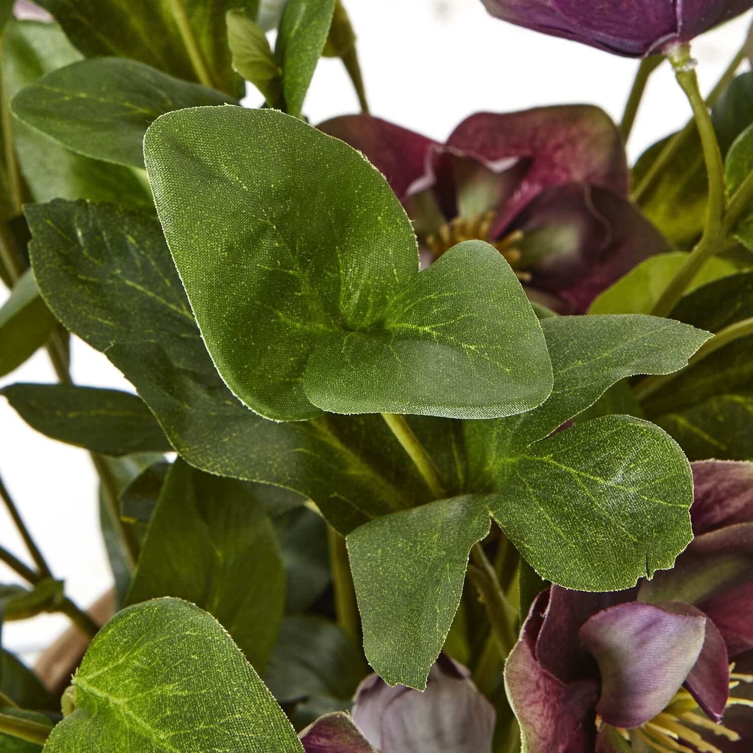 Lifelike plum hellebore faux plant in taupe ceramic pot, ultra-realistic blooms and foliage for home decor. by sostter at brixbailey.com