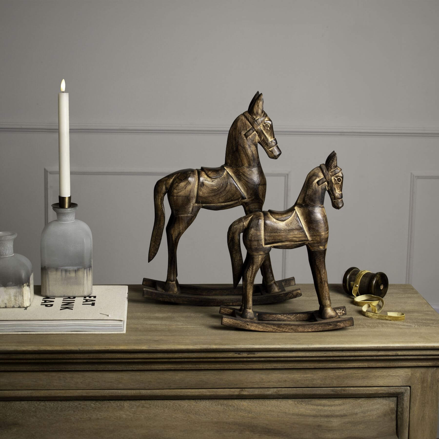 Natural wooden rocking horse for kids, handcrafted solid wood with warm brown finish, safe nursery toy. by RoomLondon at brixbailey.com