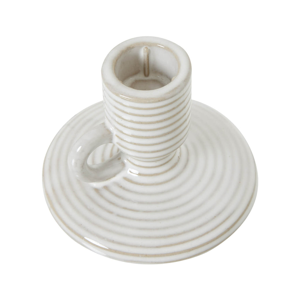White ceramic taper candle holder with integrated handle, minimalist modern design, 10 cm height.by RoomLondon at brixbailey.com