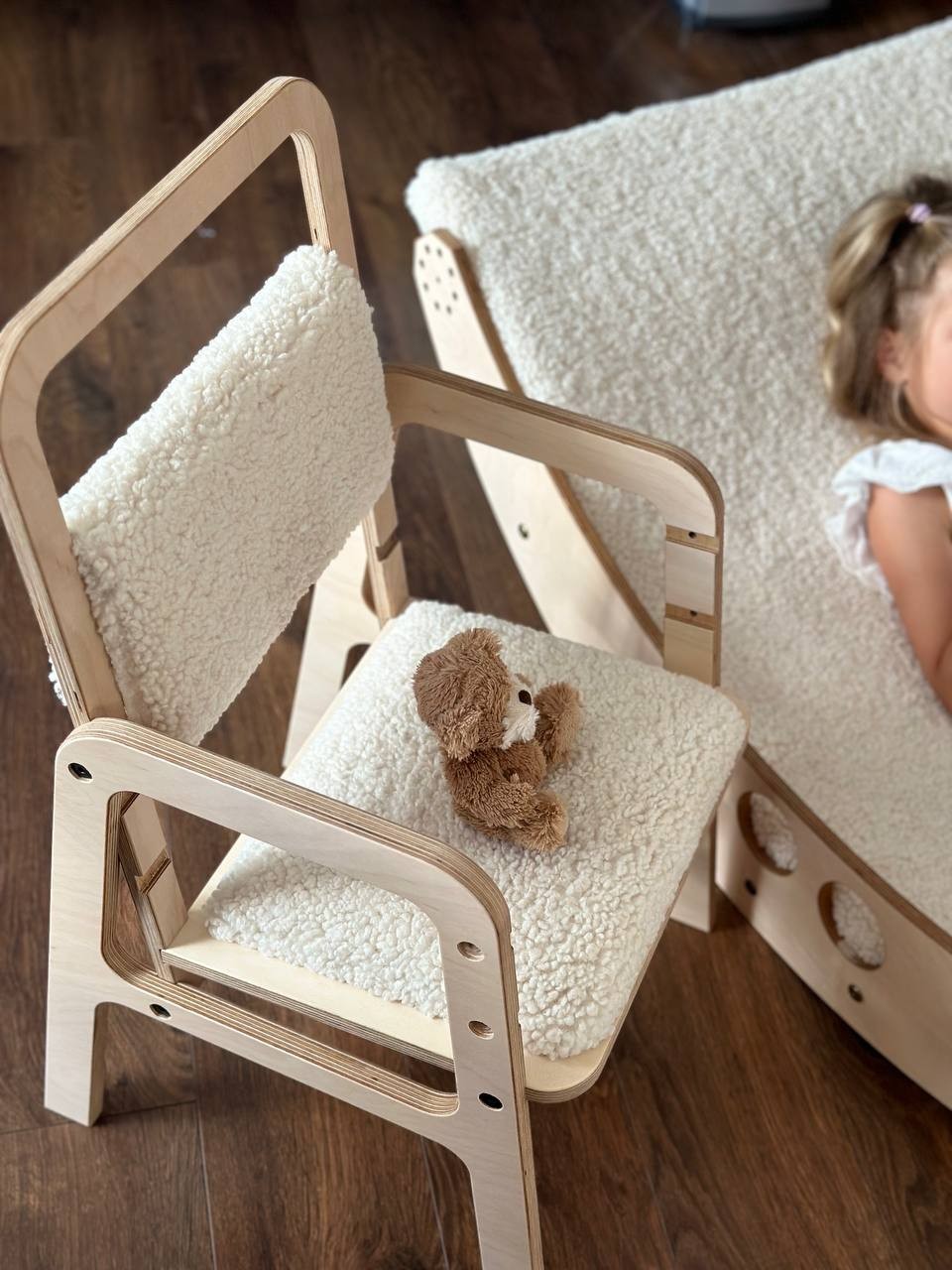 luula vanilla lamb kids chair in a bright playroom setting