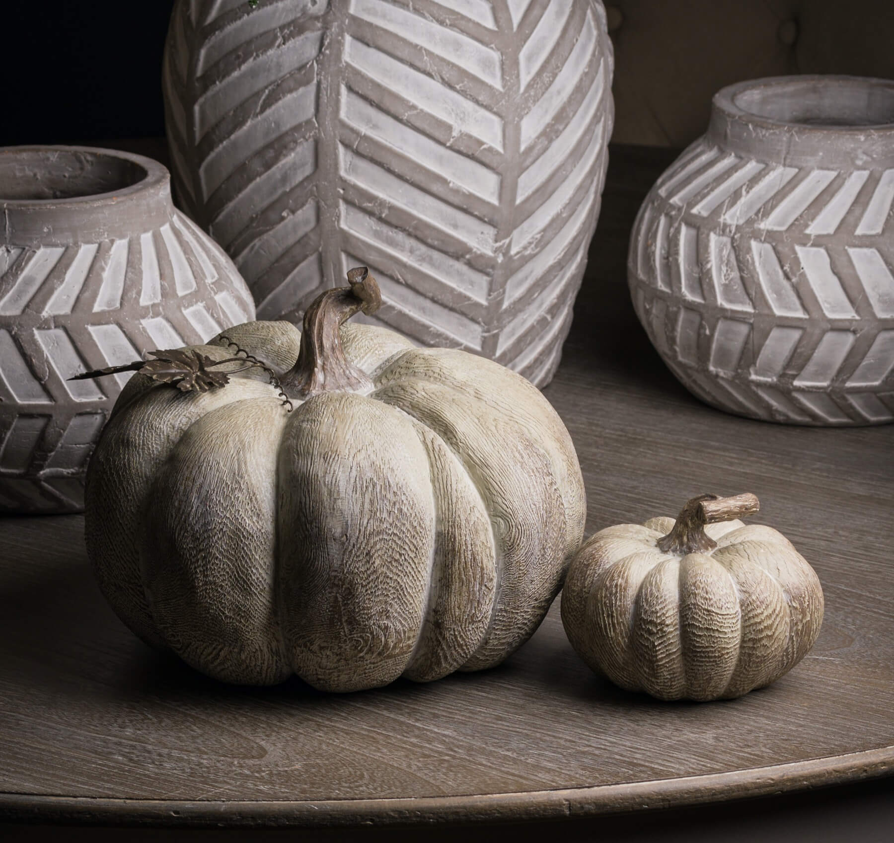 Handcrafted whitewashed resin pumpkin centerpiece with wood-grain texture, perfect for farmhouse or seasonal decor by RoomLondon at brixbailey.com