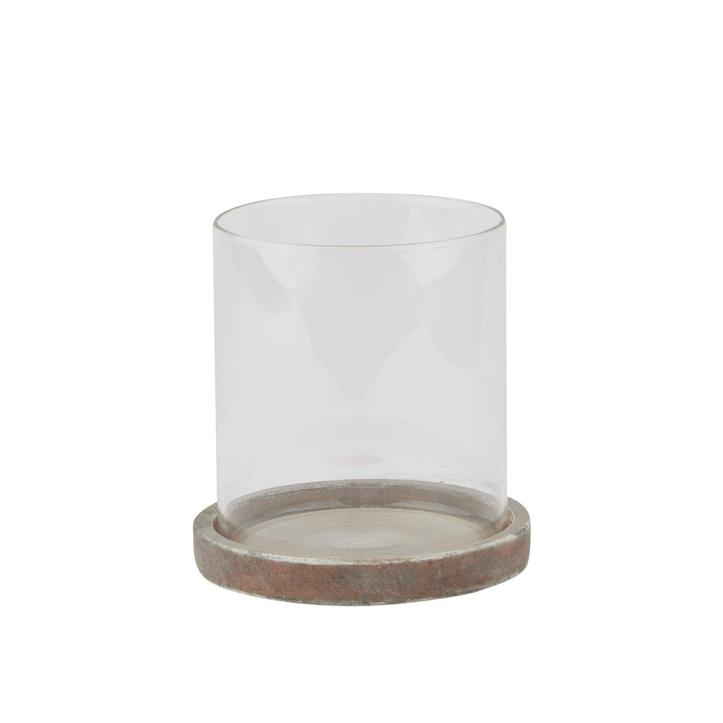 Handcrafted brown ceramic hurricane lantern with rustic charm, perfect for cozy indoor or outdoor mood lighting. by RoomLondon at brixbailey.com
