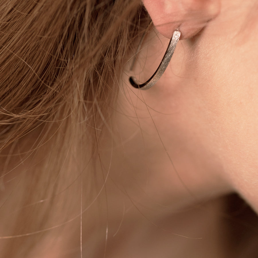 softly lit elegant small arch earrings with a gentle brushed finish, a comforting gift for her