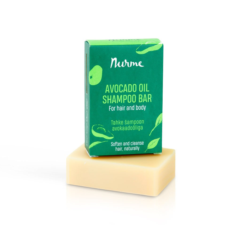 a bold close-up of our nourishing avocado oil shampoo bar with rich green accents