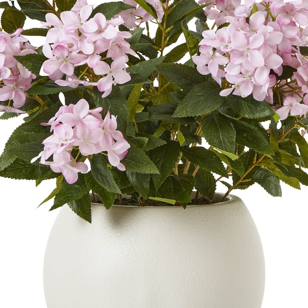 Large pink faux hydrangea plant in pot with lifelike blooms, soft pastel color, ready-to-display home decor centerpiece by Sostter at brixbailey.com