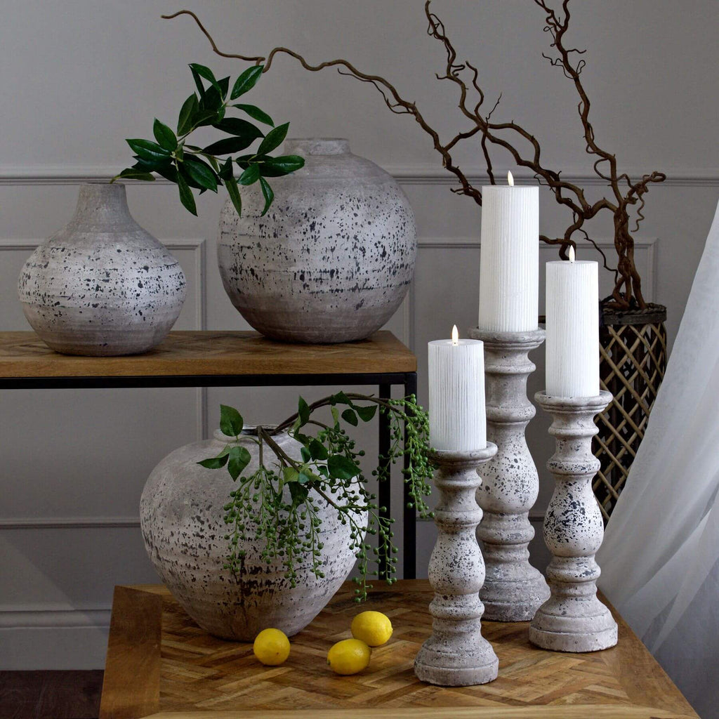 Stone ceramic column candle holder with weathered texture in natural tone, 45cm tall, for modern or traditional decor by sostter at brixbailey.com