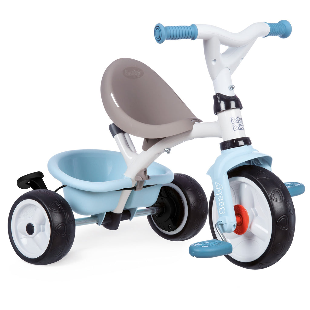soft morning light on the blue baby balade tricycle's comfortable seat and protective sun visor