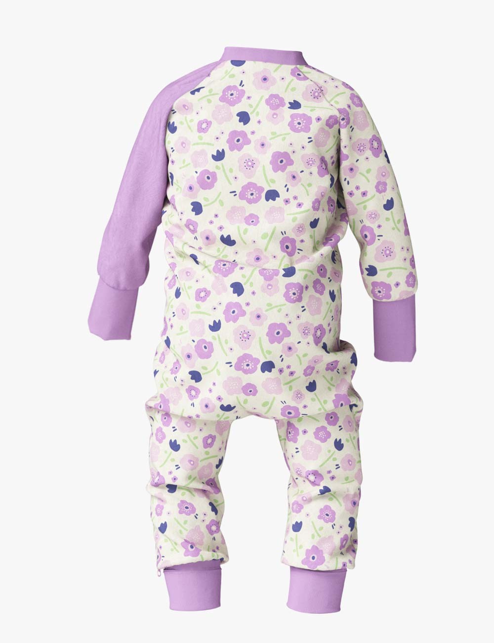 playful baby in a summer flowers freda sleepsuit laughing on a sunny day