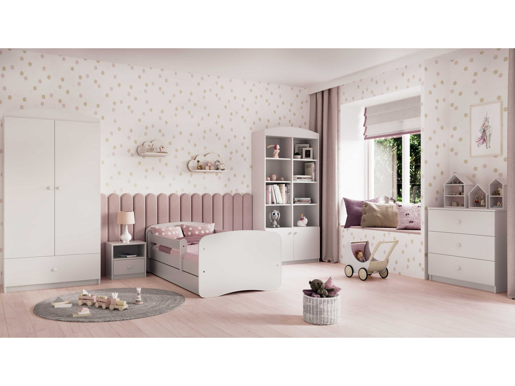 babydreams children's bed with birch slat frame and two-drawer storage in a cozy bedroom