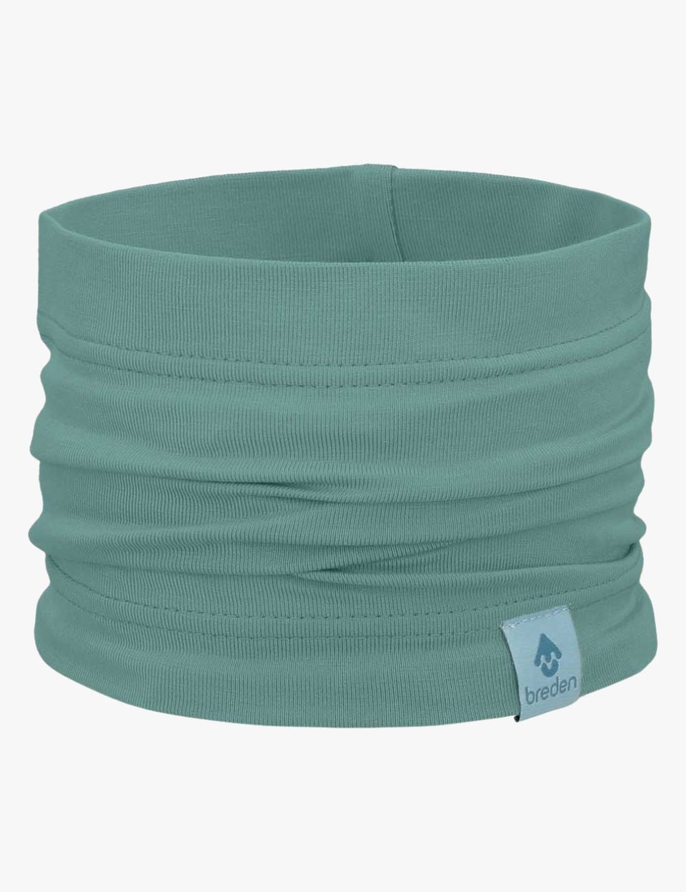 a child laughing while wearing a lightweight bamboo scarf on a sunny day, the fabric flowing gently in a summer breeze