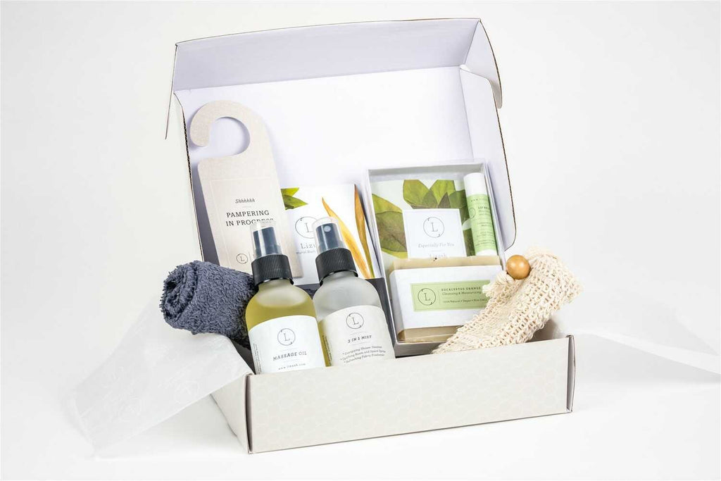 bold hero shot of a complete eucalyptus spa gift set for him and her in an elegant box