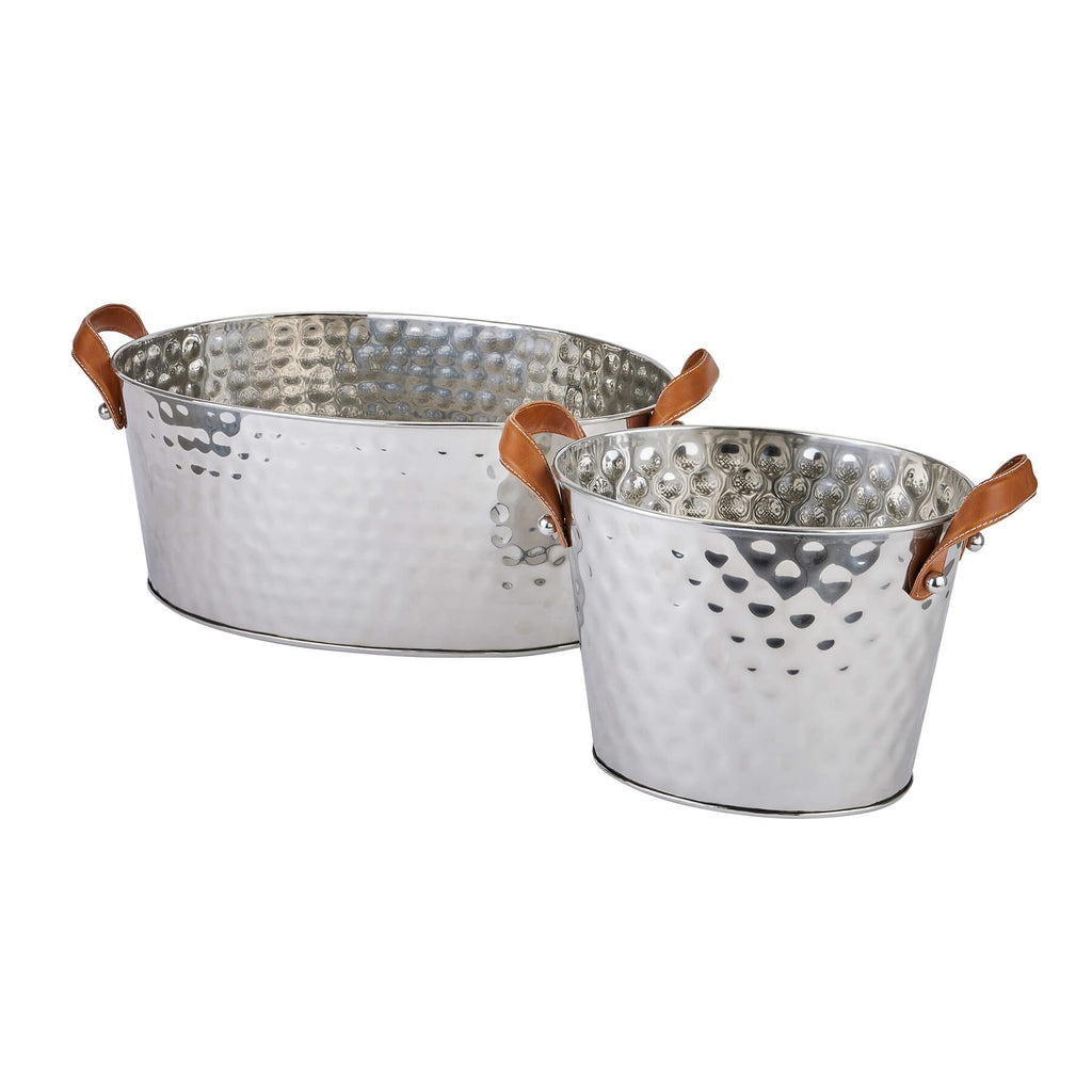 Silver champagne cooler with hand-hammered metal and leather handles, perfect for elegant entertaining by RoomLondon at brixbailey.com