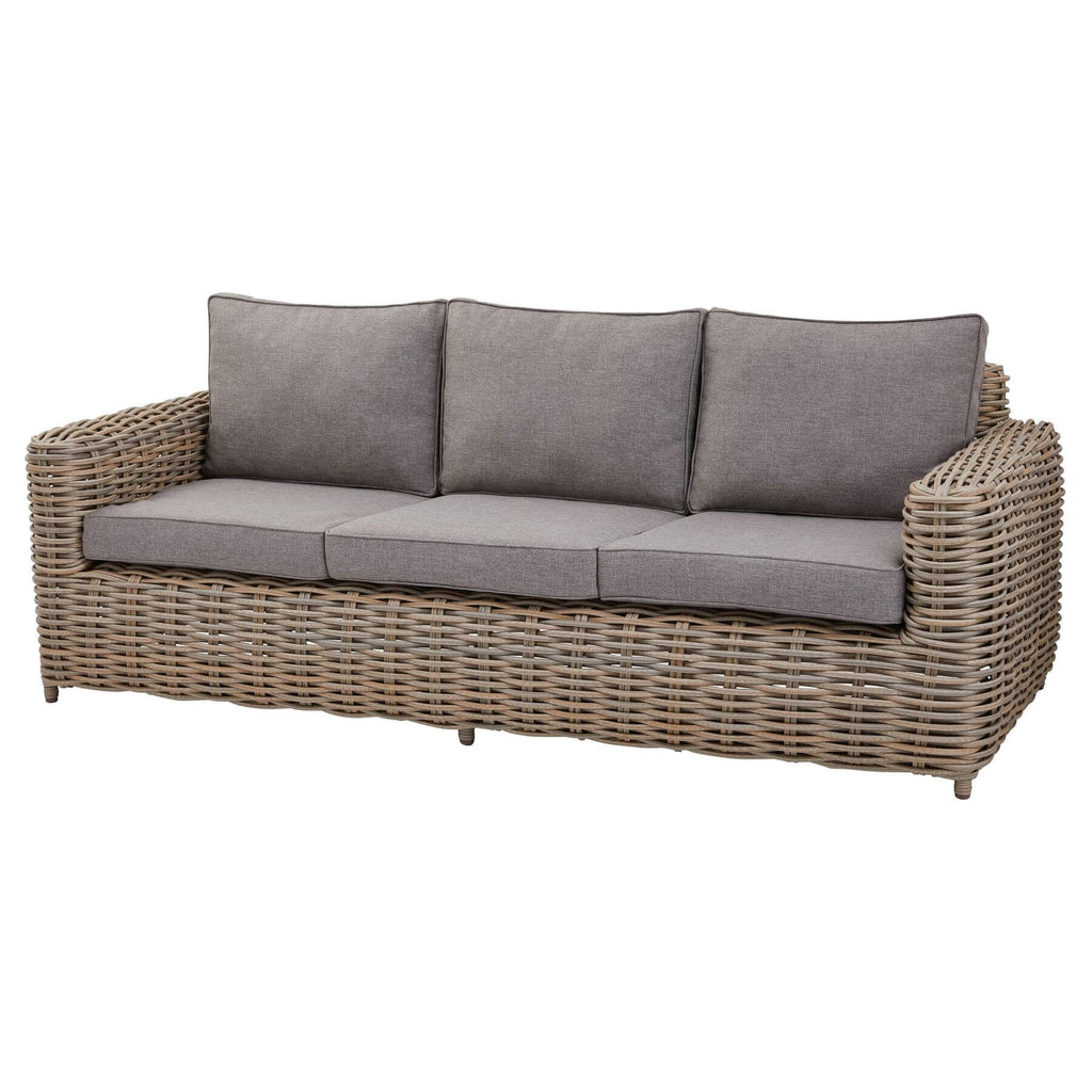 Premium beige 5-piece outdoor wicker set with coffee table and Olefin cushions on patio by Sostter at brixbailey.com