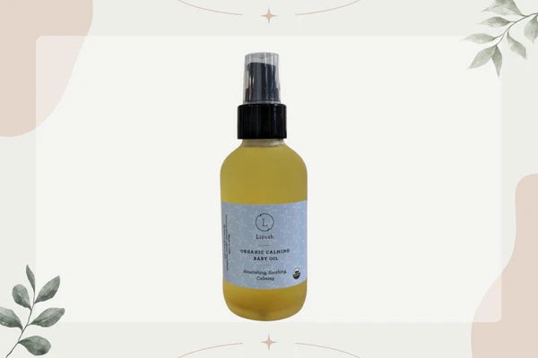 elegant glass bottle of natural stretch mark oil with a golden dropper on a marble surface