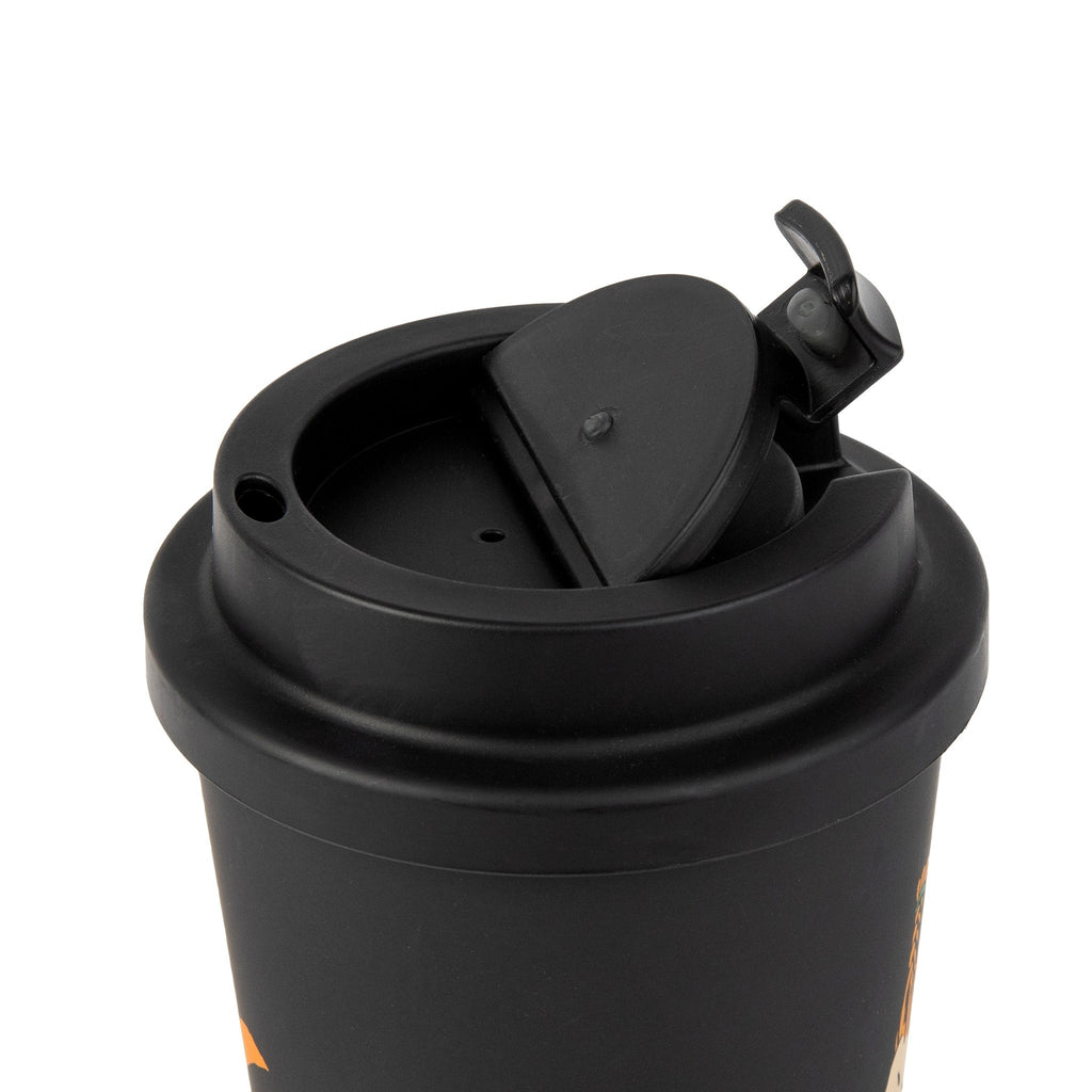 soft morning light on a black biodegradable coffee mug with a secure lid