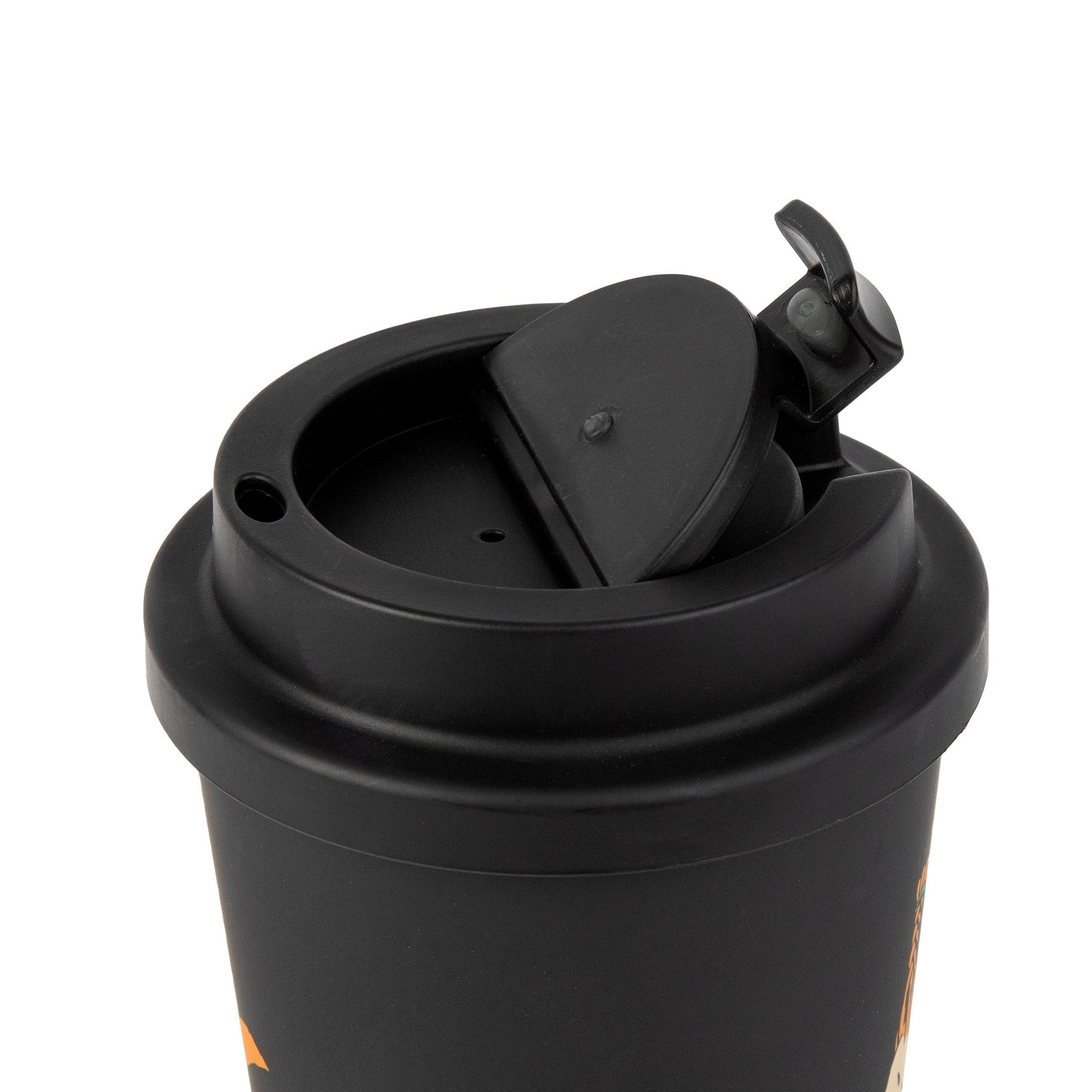 soft morning light on a black biodegradable coffee mug with a secure lid