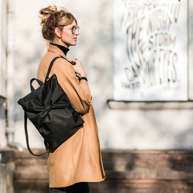 Black Bow Backpack – Elegant, Waterproof & Comfortable by Muni at www.brixbailey.com