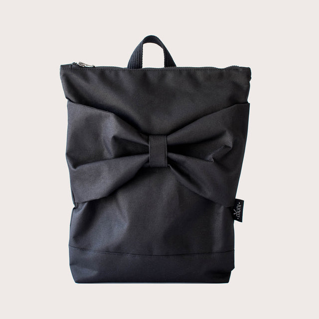 Black Bow Backpack – Elegant, Waterproof & Comfort-Fit by Muni at www.brixbailey.com