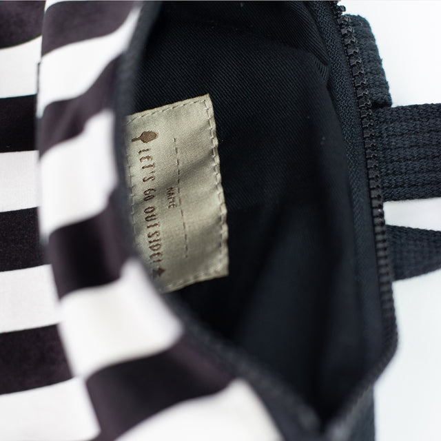 Striped Backpack – Chic & Durable with Unique Black and White Design by Muni at www.brixbailey.com