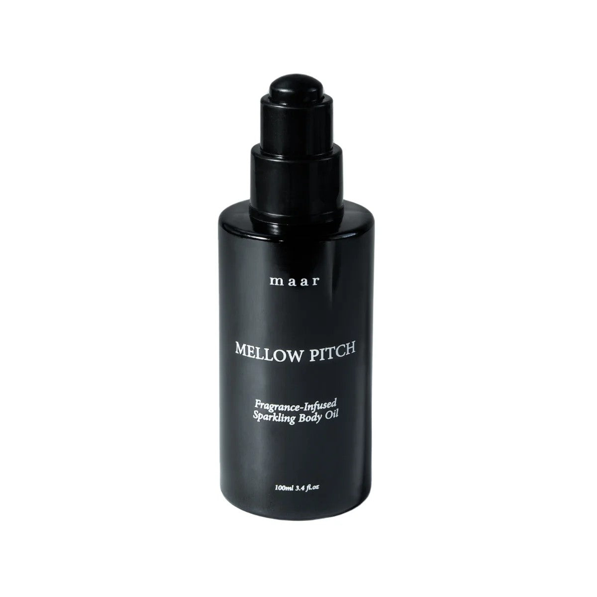 confident woman applying mellow pitch luxury body oil with dropper