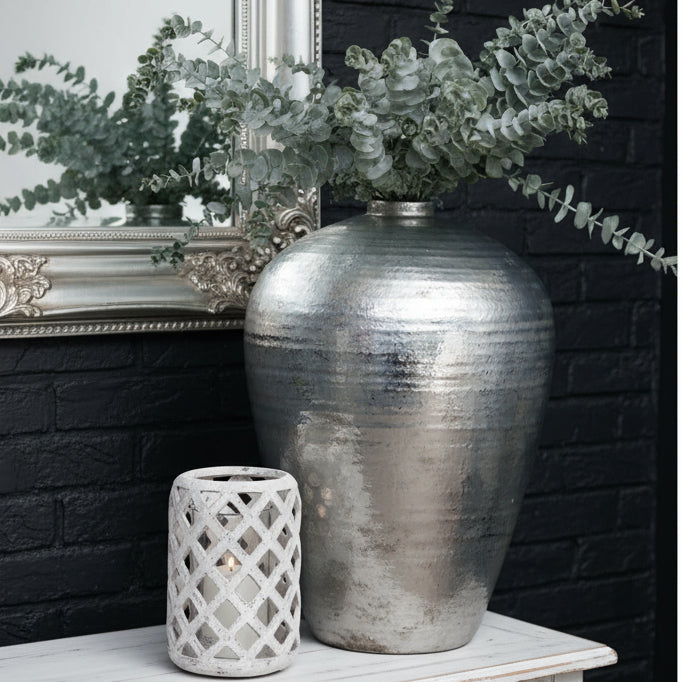 Hand-hammered silver ceramic vase with reflective metallic finish, modern home decor statement piece by sostter at brixbailey.com