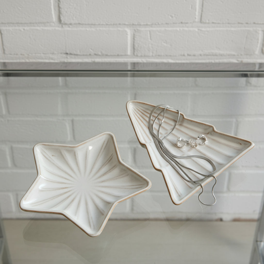 an elegant white ceramic star dish casting soft geometric shadows on a minimalist surface brix and bailey marketplace