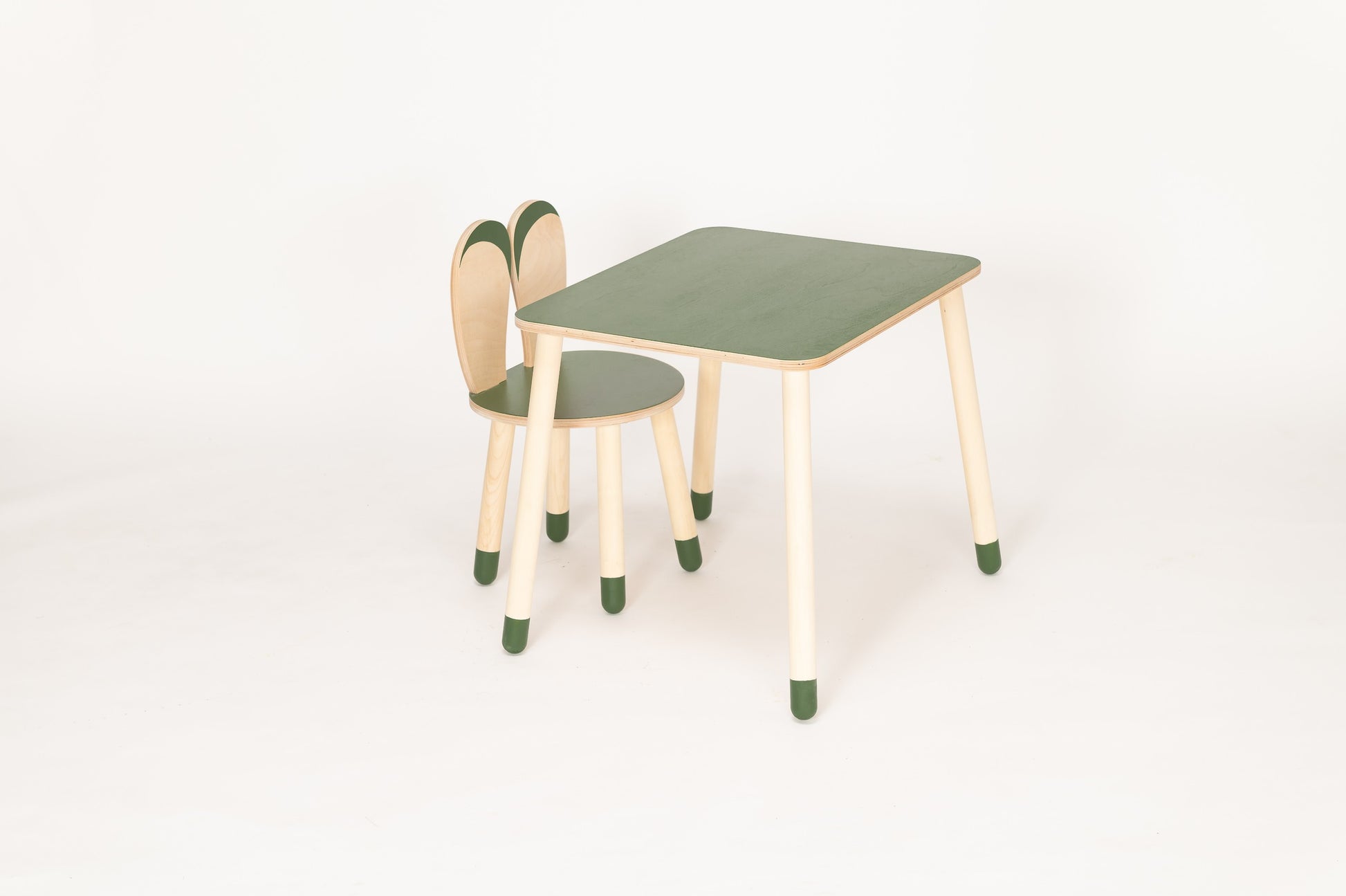 bold front view of a sturdy birch plywood bunny table for kids playroom