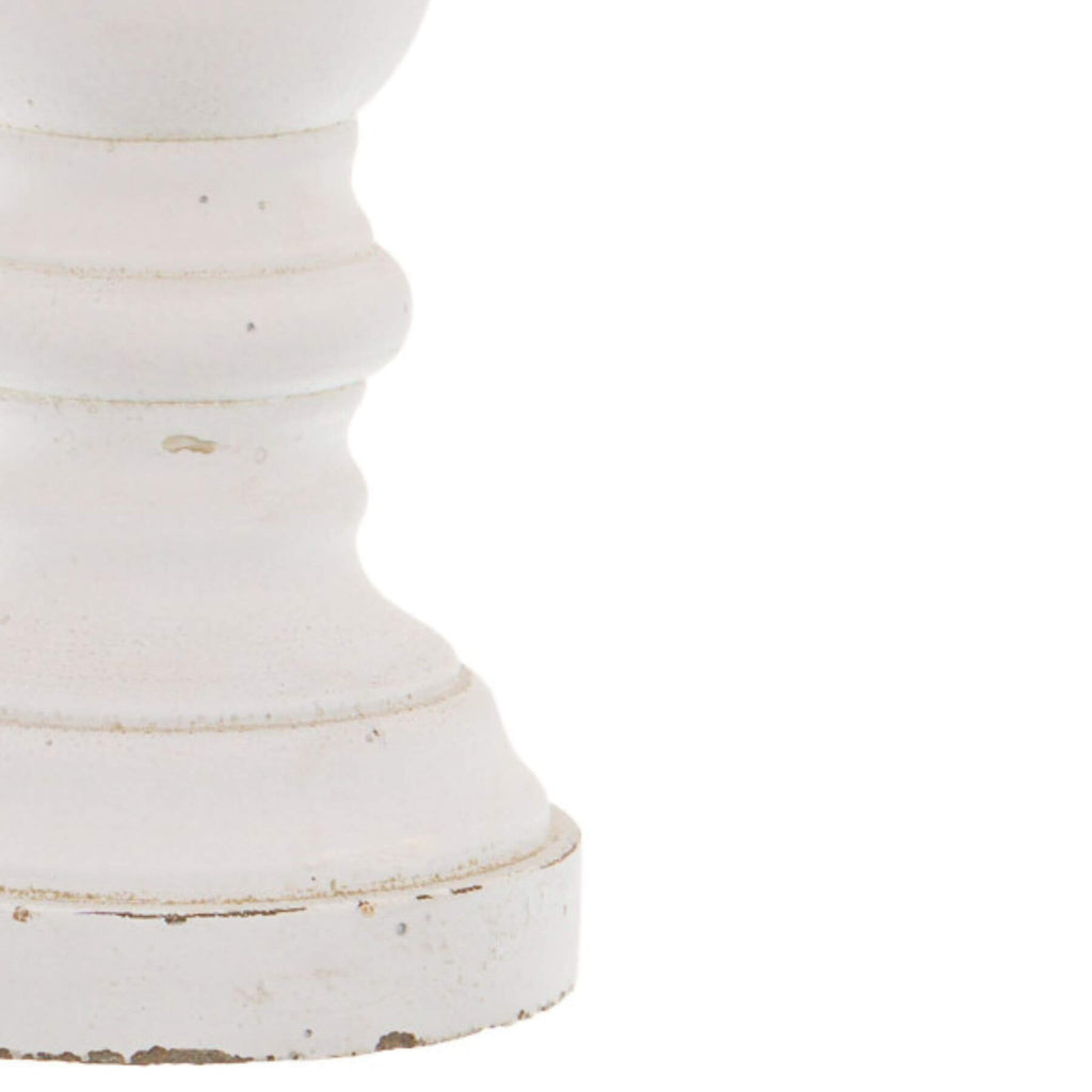 Minimalist white ceramic column candle holder with silver pinecone finial, 31cm tall, matte finish for ambient lighting by RoomLondon at brixbailey.com